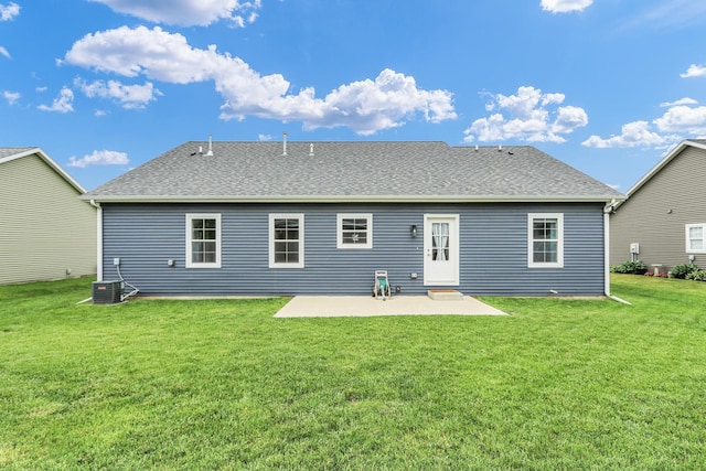 1608 E Horizon Ln, Urbana, IL 61802 - back of house with a patio area, a lawn, and a shingled roof