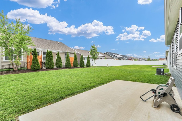 1608 E Horizon Ln, Urbana, IL 61802 - view of yard featuring a patio, central air condition unit, and a residential view