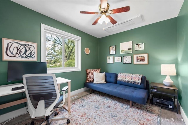 office area featuring baseboards, a ceiling fan, and carpet flooring