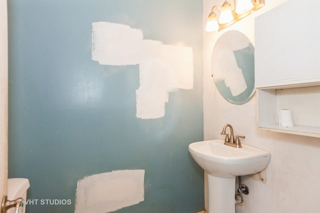 563 Lynn Ct Unit A, Glendale Heights, IL 60139 - half bath featuring toilet and a sink