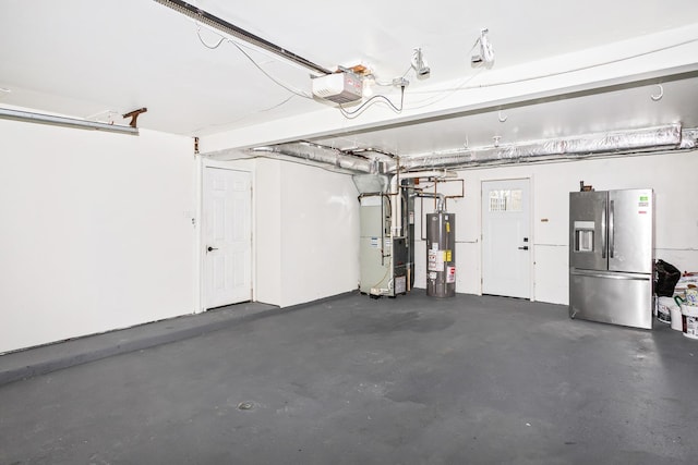 garage featuring stainless steel refrigerator with ice dispenser, gas water heater, a garage door opener, and heating unit