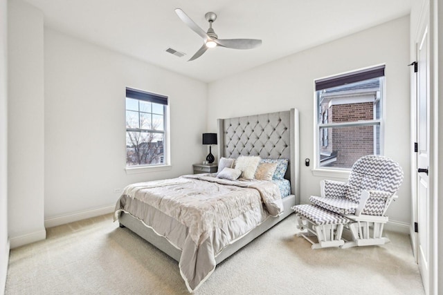bedroom featuring carpet floors, baseboards, and ceiling fan
