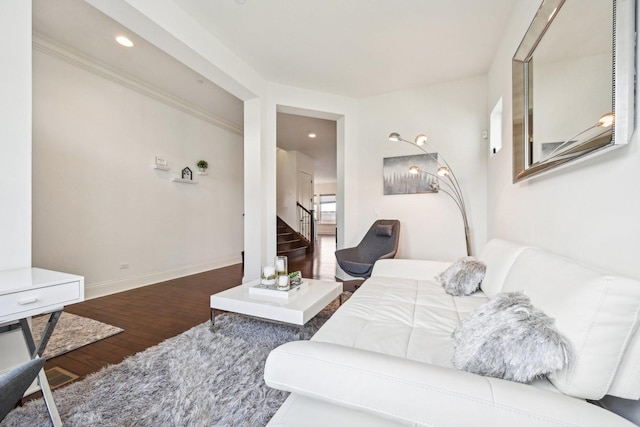 bedroom with wood finished floors, recessed lighting, and baseboards