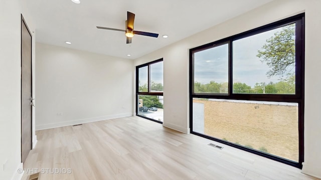 6330 Hennings Ct, Morton Grove, IL 60053 - spare room with ceiling fan, light wood-style floors, recessed lighting, and baseboards