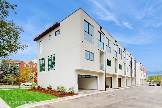 6330 Hennings Ct, Morton Grove, IL 60053 - view of building exterior featuring an attached garage and a residential view