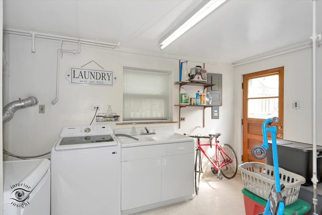 clothes washing area featuring cabinet space and washer and dryer