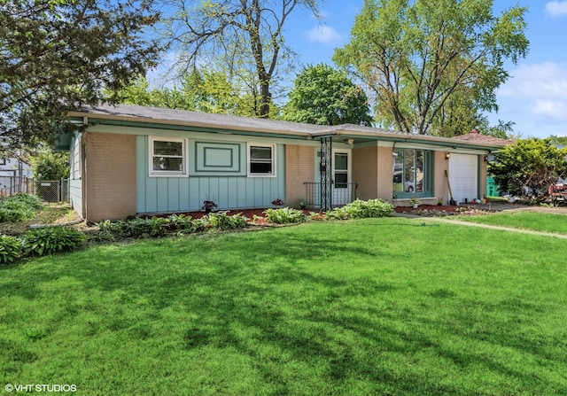 1011 Beverly Dr, Wheeling, IL 60090 - ranch-style house featuring brick siding, a garage, and board and batten siding