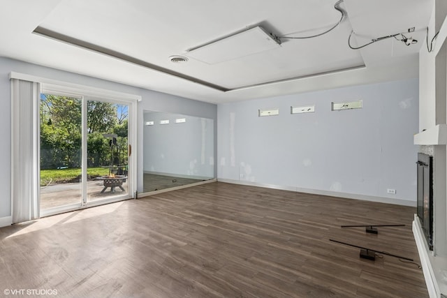 1011 Beverly Dr, Wheeling, IL 60090 - unfurnished living room with wood finished floors, baseboards, and a glass covered fireplace
