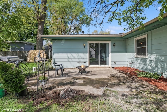 1011 Beverly Dr, Wheeling, IL 60090 - back of house featuring an outdoor fire pit, a patio area, and fence