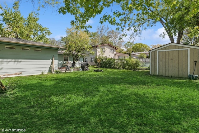 1011 Beverly Dr, Wheeling, IL 60090 - view of yard with a storage unit and an outbuilding
