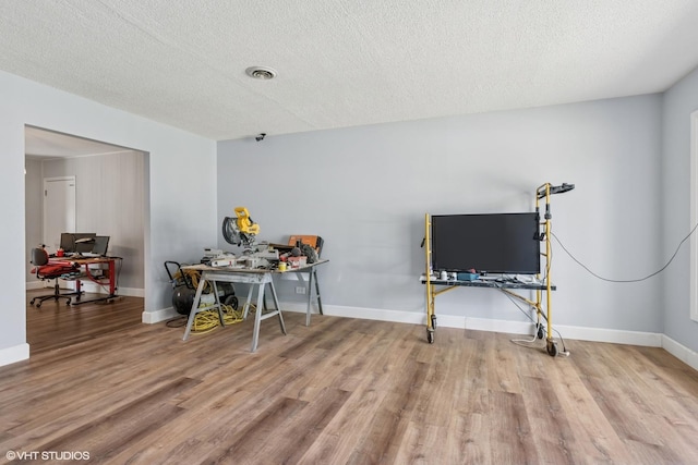 1011 Beverly Dr, Wheeling, IL 60090 - rec room featuring an office area, wood finished floors, a textured ceiling, and baseboards