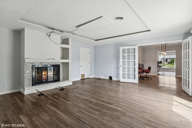 1011 Beverly Dr, Wheeling, IL 60090 - unfurnished living room with french doors, wood finished floors, baseboards, and a glass covered fireplace