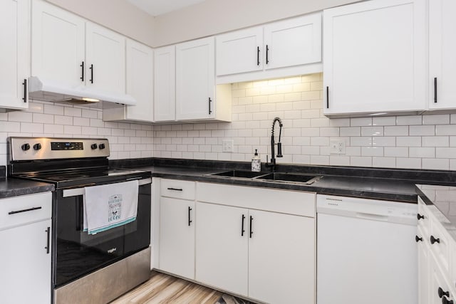 kitchen with stainless steel range with electric stovetop, white dishwasher, under cabinet range hood, a sink, and white cabinets