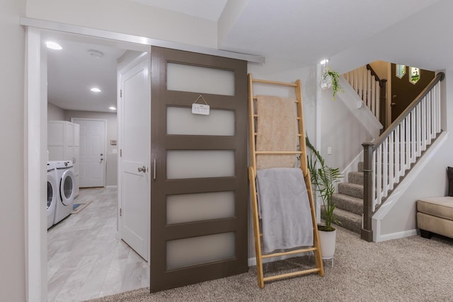 stairway with washer and clothes dryer, recessed lighting, and baseboards