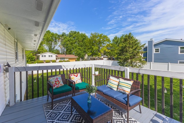deck featuring outdoor lounge area