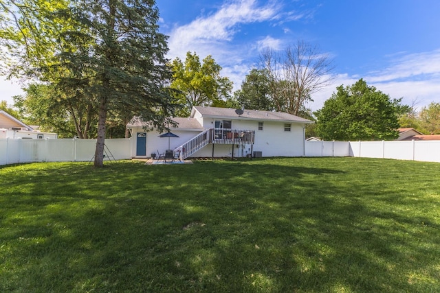 back of house with stairway, a patio, and a wooden deck