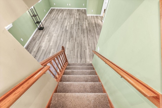 123 E 14th St, Gibson City, IL 60936 - staircase featuring baseboards and wood finished floors