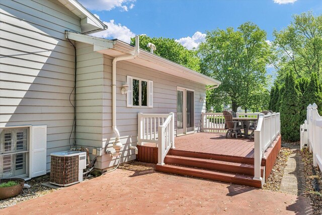 123 E 14th St, Gibson City, IL 60936 - wooden terrace featuring central air condition unit