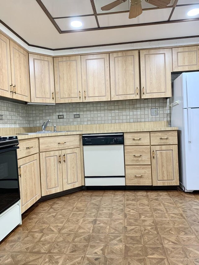 kitchen featuring white appliances, light brown cabinets, light countertops, a ceiling fan, and recessed lighting