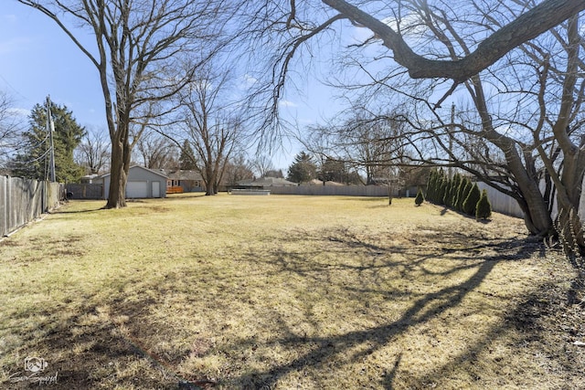 view of yard with a garage
