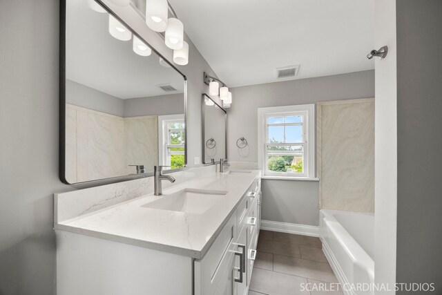 115 W Maple St, Lombard, IL 60148 - full bath featuring healthy amount of natural light, double vanity, tile patterned flooring, and baseboards