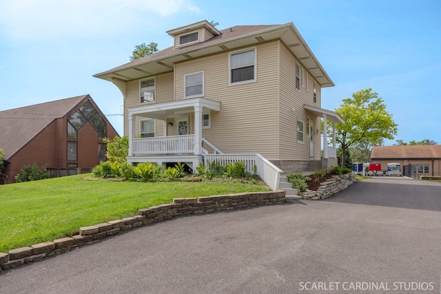 115 W Maple St, Lombard, IL 60148 - traditional style home featuring a front lawn and covered porch