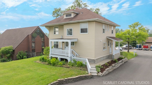 115 W Maple St, Lombard, IL 60148 - view of front of home with a front yard, covered porch, and stairway