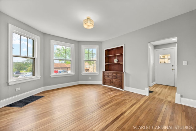 115 W Maple St, Lombard, IL 60148 - unfurnished room with light wood-type flooring and baseboards