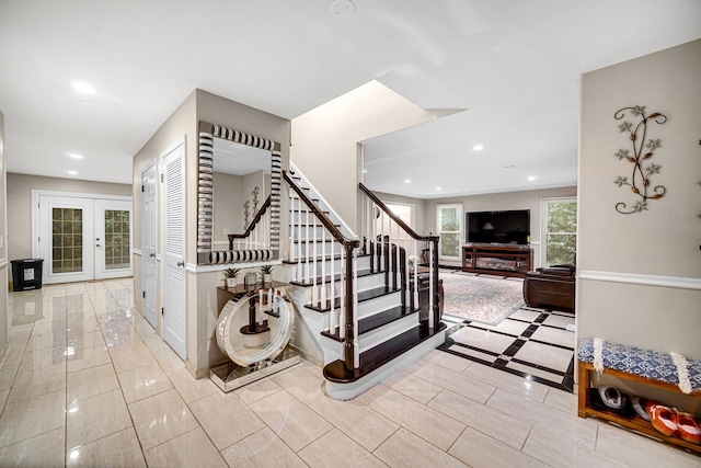 320 Brampton Ln, Arlington Heights, IL 60004 - staircase featuring french doors, tile patterned flooring, and recessed lighting