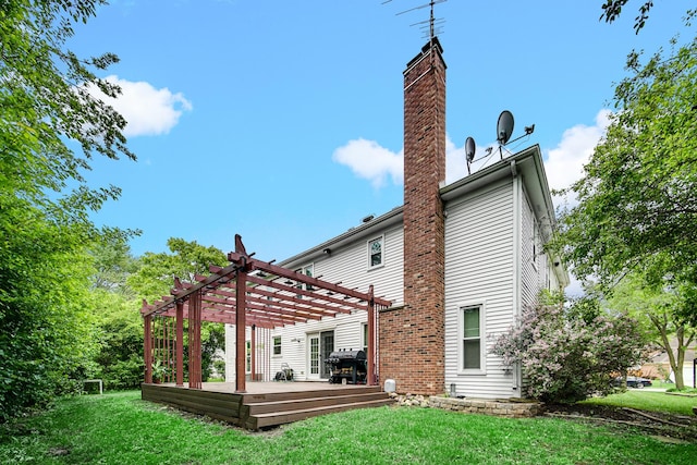 320 Brampton Ln, Arlington Heights, IL 60004 - back of property featuring a pergola, a yard, a wooden deck, and a chimney