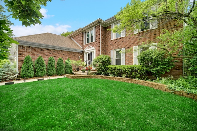 320 Brampton Ln, Arlington Heights, IL 60004 - view of front of property with a front yard and brick siding