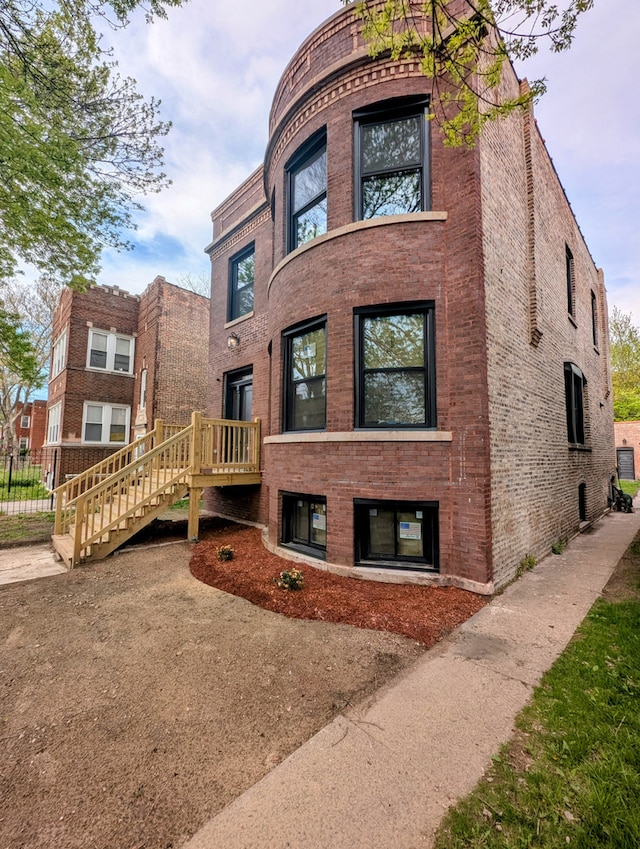 7411 S Champlain Ave, Chicago, IL 60619 - view of property featuring stairs