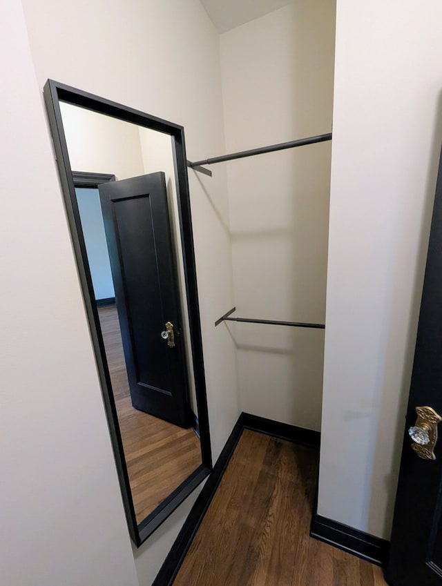 7411 S Champlain Ave, Chicago, IL 60619 - bathroom featuring wood finished floors and baseboards