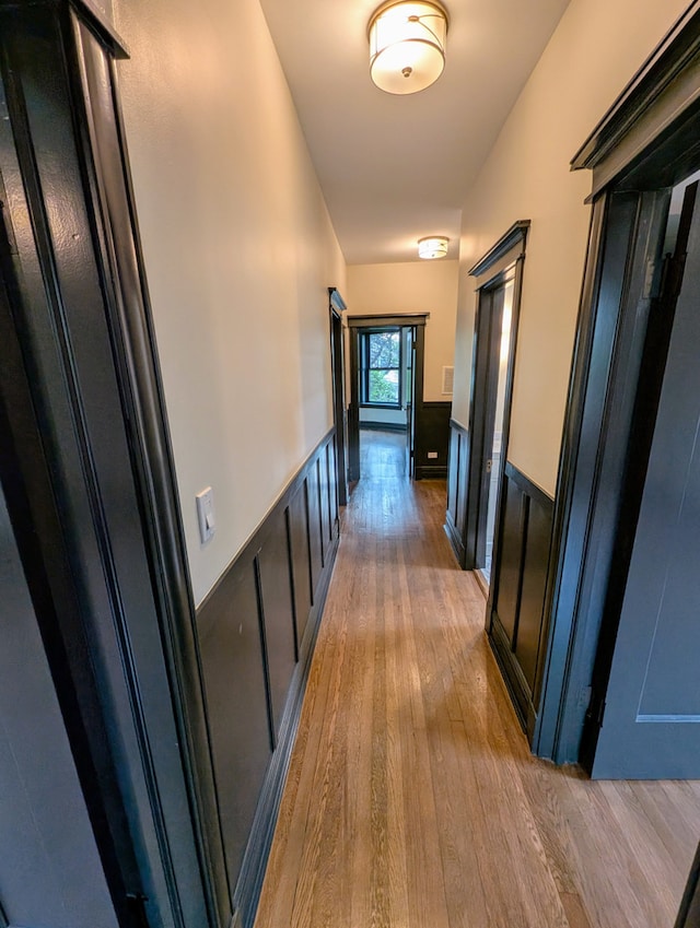 7411 S Champlain Ave, Chicago, IL 60619 - hall with wainscoting and light wood-type flooring