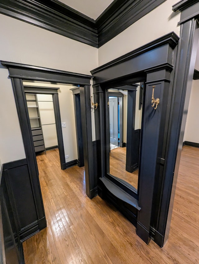 7411 S Champlain Ave, Chicago, IL 60619 - corridor with crown molding and light wood-style floors