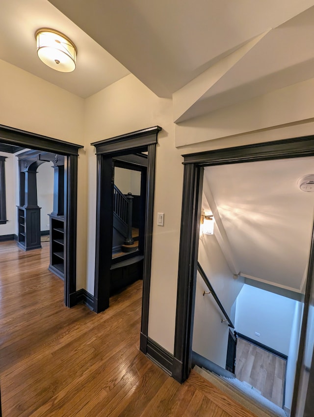 7411 S Champlain Ave, Chicago, IL 60619 - hallway featuring an upstairs landing, wood finished floors, and baseboards