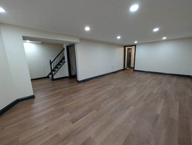 7411 S Champlain Ave, Chicago, IL 60619 - finished basement with recessed lighting, baseboards, wood finished floors, and stairs