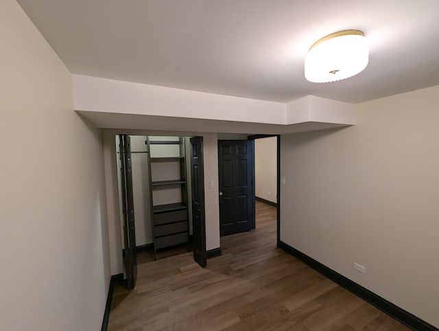 7411 S Champlain Ave, Chicago, IL 60619 - finished below grade area featuring wood finished floors and baseboards