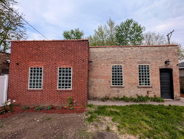 7411 S Champlain Ave, Chicago, IL 60619 - view of home's exterior featuring brick siding