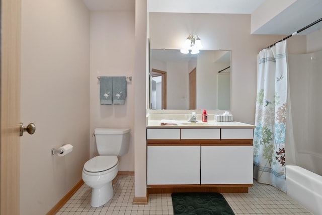 bathroom featuring toilet, vanity, shower / tub combo, baseboards, and tile patterned flooring