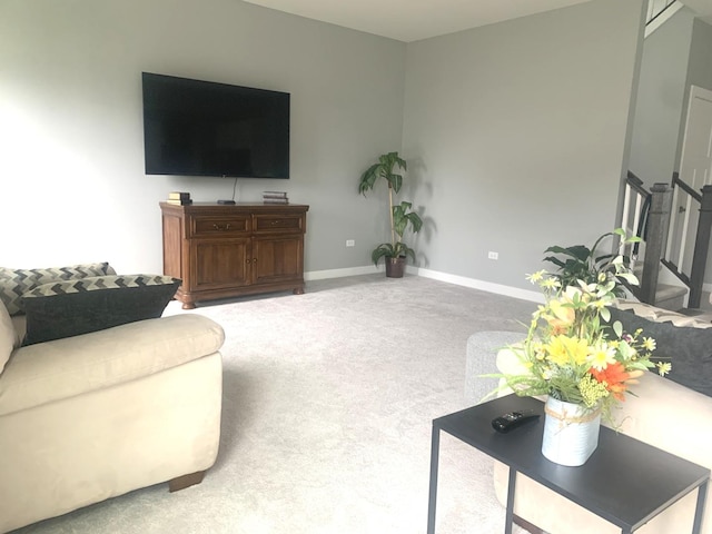 32052 N Great Plaines Ave, Lakemoor, IL 60051 - living room featuring carpet, baseboards, and stairs