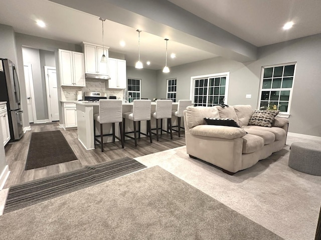 32052 N Great Plaines Ave, Lakemoor, IL 60051 - living area with dark wood-type flooring, recessed lighting, and baseboards