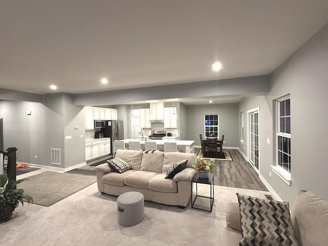 32052 N Great Plaines Ave, Lakemoor, IL 60051 - living area with recessed lighting, baseboards, and wood finished floors