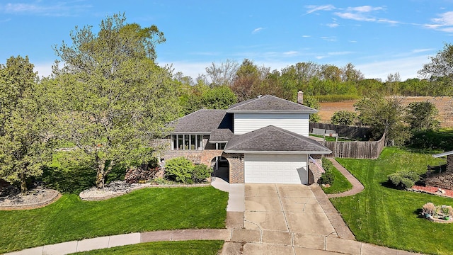 1042 Catalpa Ct, Beecher, IL 60401 - view of front facade featuring brick siding, an attached garage, concrete driveway, and a shingled roof