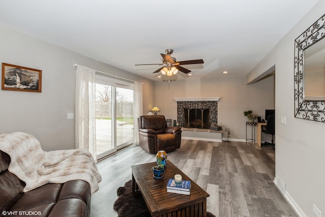 1042 Catalpa Ct, Beecher, IL 60401 - living room featuring wood finished floors, ceiling fan, a tile fireplace, recessed lighting, and baseboards