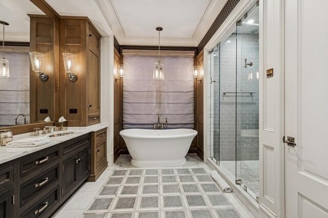 1855 N Hermitage Ave, Chicago, IL 60622 - bathroom featuring double vanity, a stall shower, a freestanding tub, and crown molding