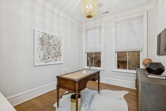 1855 N Hermitage Ave, Chicago, IL 60622 - hallway with crown molding and light wood-type flooring