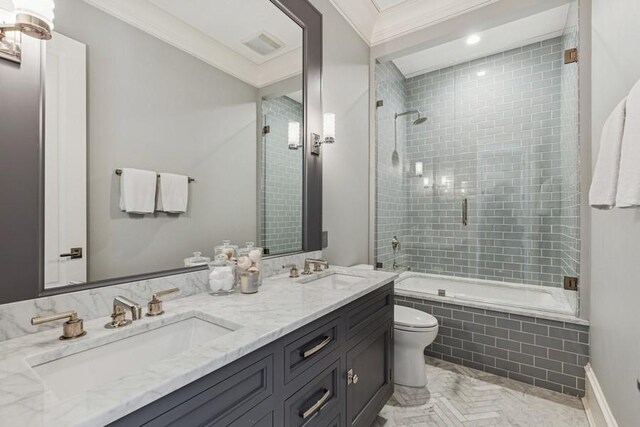 1855 N Hermitage Ave, Chicago, IL 60622 - full bathroom featuring tiled shower / bath combo, toilet, double vanity, crown molding, and baseboards