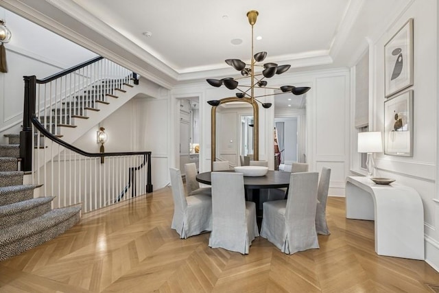 1855 N Hermitage Ave, Chicago, IL 60622 - dining area with a decorative wall, a chandelier, stairway, a tray ceiling, and ornamental molding