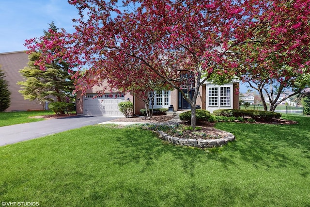 8 Georgetown Ct, Algonquin, IL 60102 - obstructed view of property with asphalt driveway and an attached garage